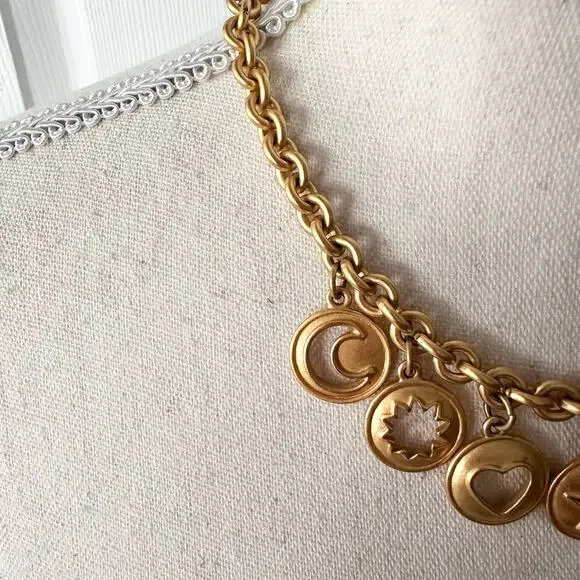 Anne Klein Vintage 80s Gold Tone Celestial Carved Medallion Charm Necklace RARE